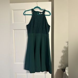 Kate Kasin green halter swing dress with lace accents